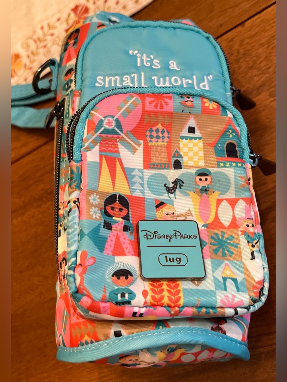 Disney Parks Lug Huggie “It’s a Small World” Turquoise Multicolor Crossbody.